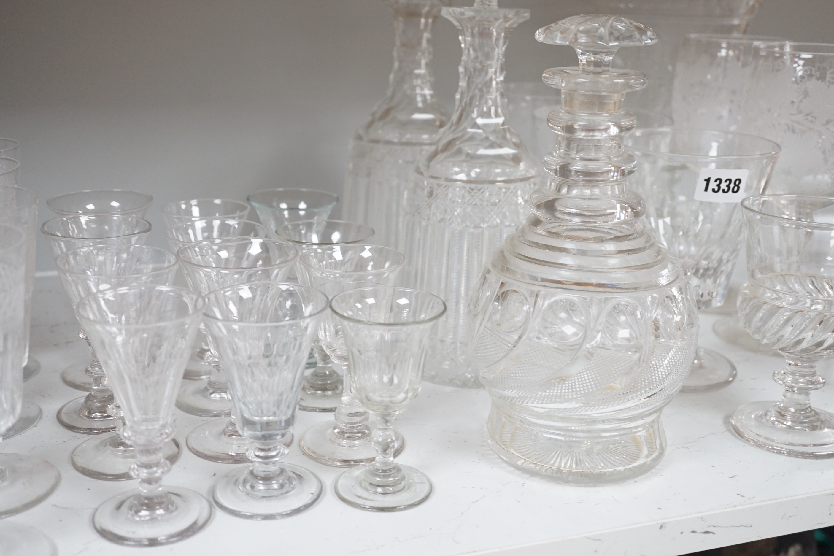 Assorted 19th and 20th century drinking glasses, rinsers, an etched vase, a pair of cut glass decanters and a late Georgian Anglo-Irish decanter and stopper